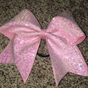 Pink sparkly cheer bow